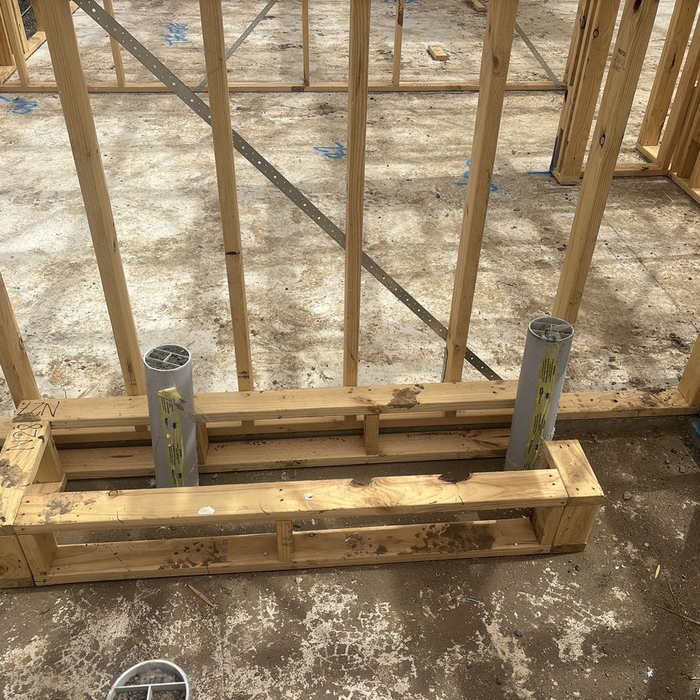 Waste point cast in the wrong spot, so concrete must be cut to move it, found during a frame inspection in Beveridge