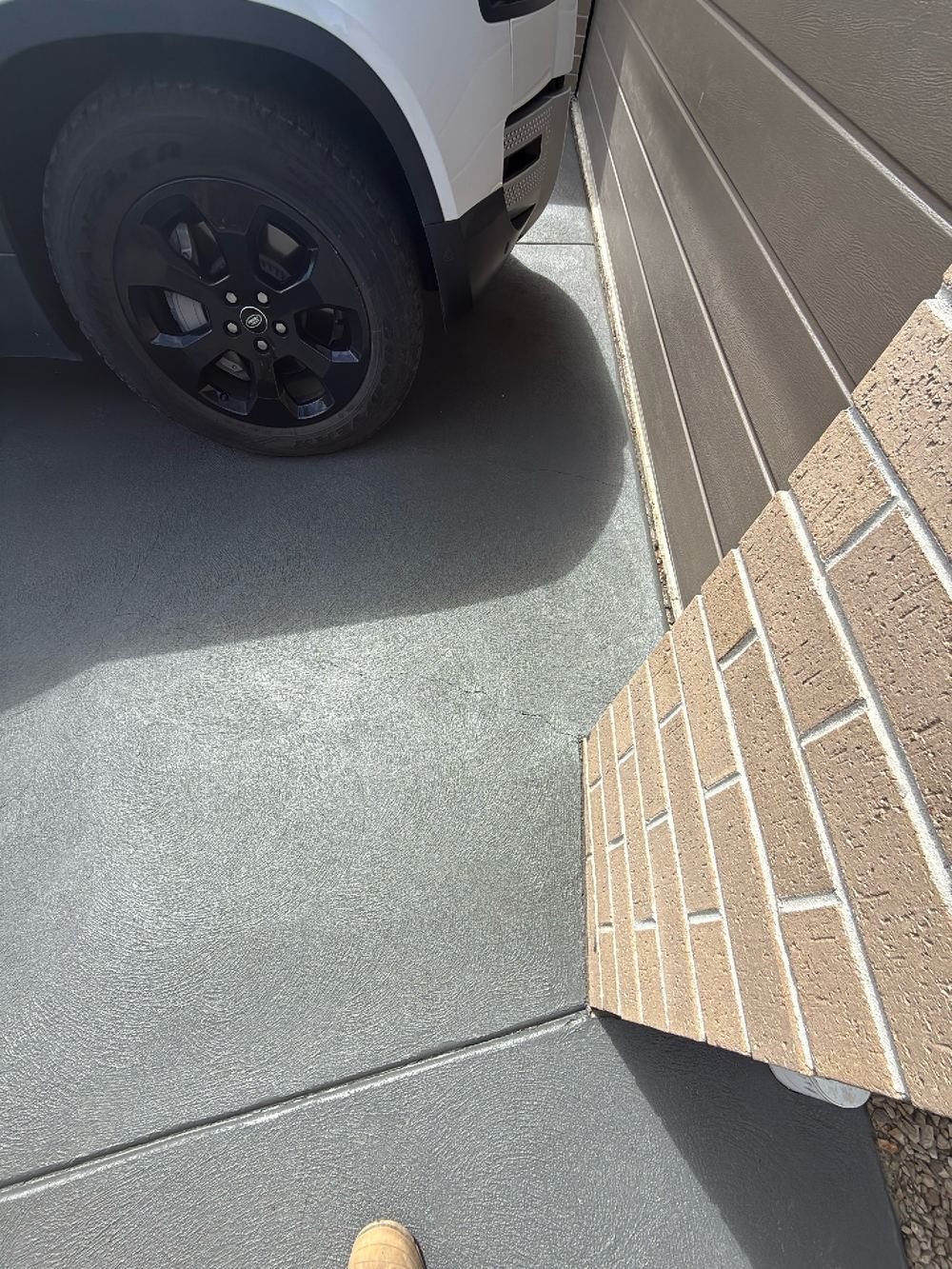 Minor surface cracking across the concrete driveway, recorded for monitoring, Doreen, Beveridge